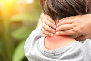 image of a Woman experiencing Neck pain